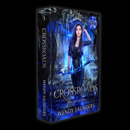 A boxed book cover for "Crossroads" by Wendy Saunders, shown at a slight angle on a black background. The cover features a dark fantasy-style illustration of a woman in black clothing surrounded by glowing blue magical light, with the title and author name in large white text.